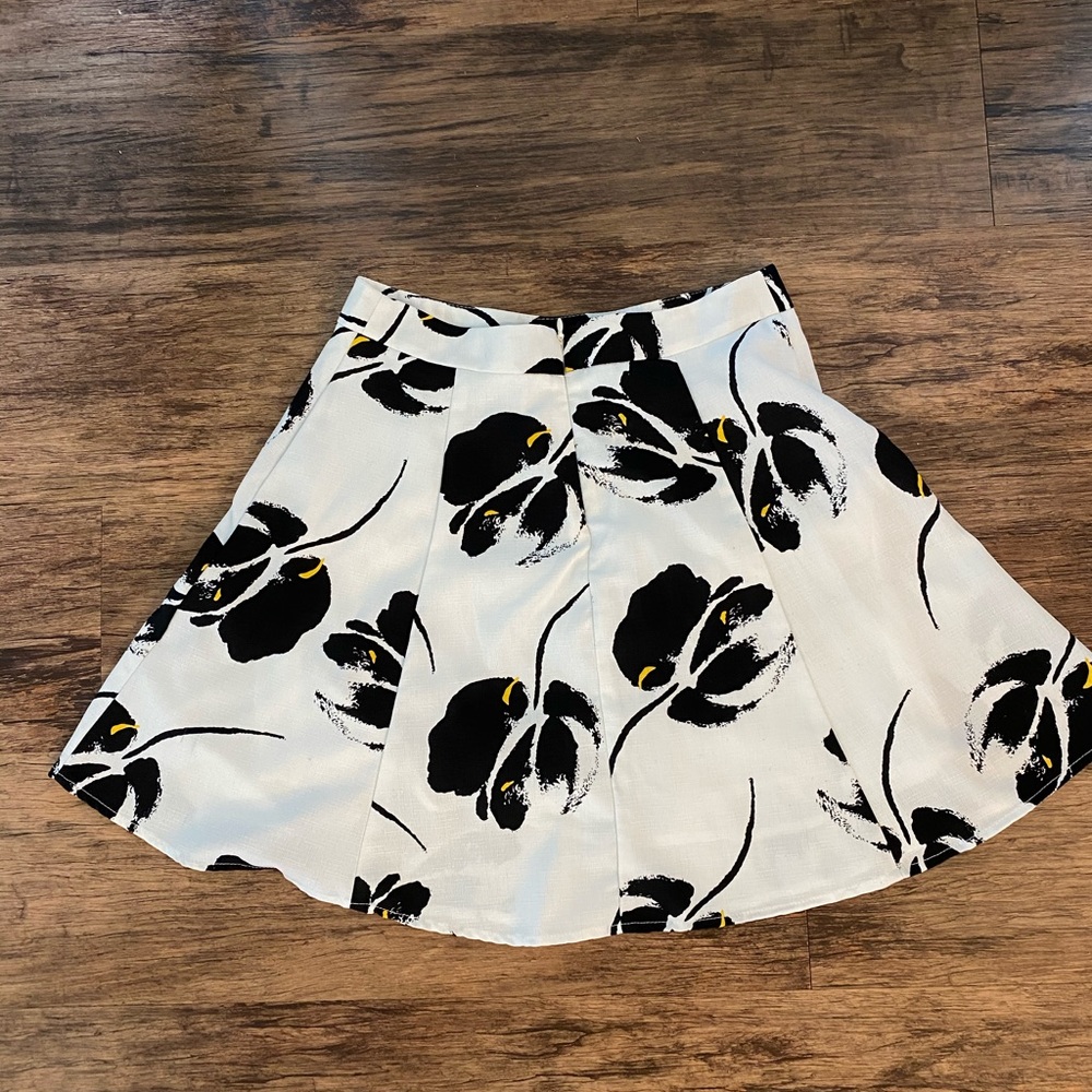 White skirt with floral designs
